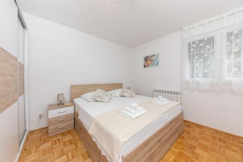 Modern apartment PRISHA - SPLIT tesisinde bir odada yatak veya yataklar