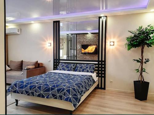 Katil atau katil-katil dalam bilik di Apartment on Potanina 16