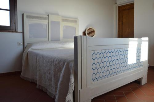 Postel nebo postele na pokoji v ubytování Agriturismo Corte Dainelli