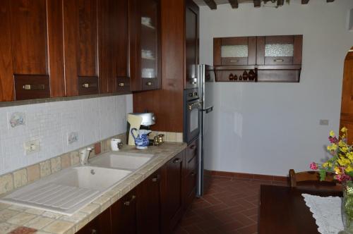 Kuchyň nebo kuchyňský kout v ubytování Agriturismo Corte Dainelli