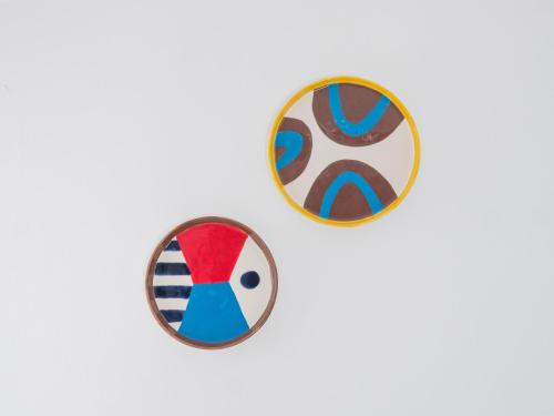 two plates on a white wall next to each other at Tour de Nesle La Rochelle Vieux Port 3 etoiles in La Rochelle
