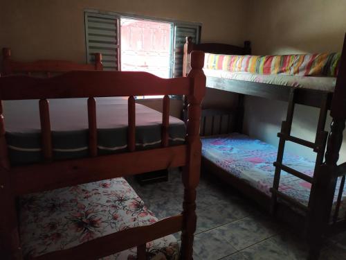 Krevet ili kreveti na sprat u jedinici u okviru objekta Chácara Recanto do Vermelho