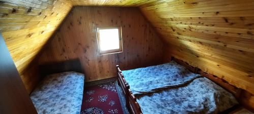 מיטה או מיטות בחדר ב-Entire Holiday Home Jovanita
