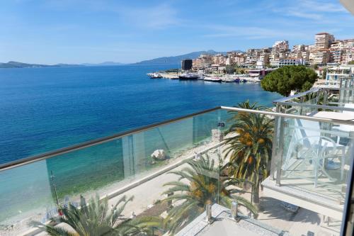 a view of the ocean from the balcony of a building at Republika Hotel in Sarandë