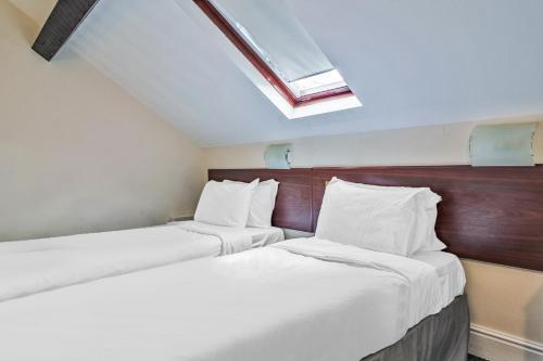 Ένα ή περισσότερα κρεβάτια σε δωμάτιο στο Mountain Park Hotel