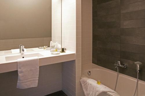 
Ein Badezimmer in der Unterkunft Golf & Country Hotel - Clervaux
