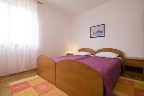 Postel nebo postele na pokoji v ubytování Apartment in Nin with sea view, terrace, air conditioning, Wi-Fi (4868-4)