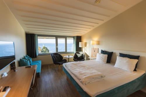 Un ou plusieurs lits dans un hébergement de l'établissement Hotel Sonderborg Strand