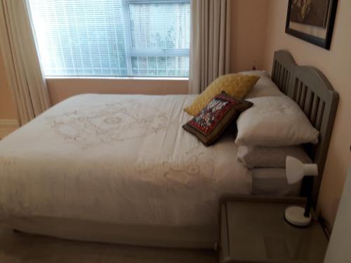 Ein Bett oder Betten in einem Zimmer der Unterkunft Joans place selfcatering