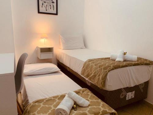 Cama o camas en una habitación de Apartamento Morumbi Inteiro 91