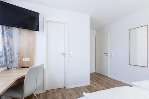 Katil atau katil-katil dalam bilik di Hotel Eydt Kirchheim
