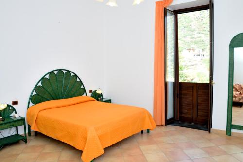 Cama o camas de una habitación en Hotel Principe di Rinella