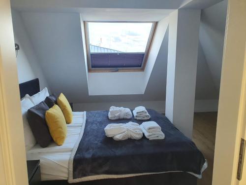 Ένα ή περισσότερα κρεβάτια σε δωμάτιο στο Apartament BLUE37