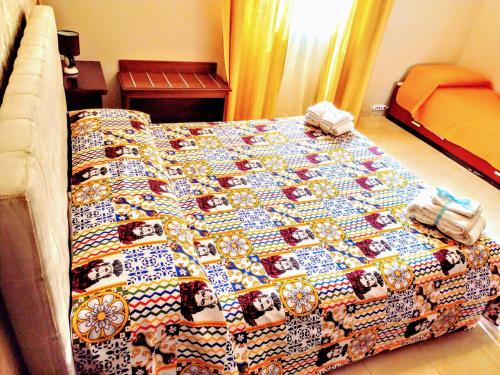 Ένα ή περισσότερα κρεβάτια σε δωμάτιο στο Bed & Breakfast Delle Palme