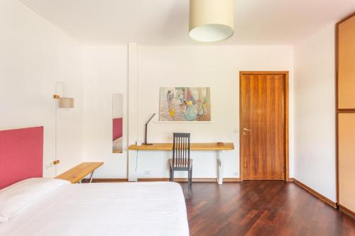 Uma cama ou camas num quarto em Baveno Beach - Charming Flat With Garden