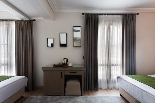 Mest Hotel Istanbul Sirkeciにあるベッド