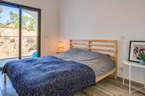 Ένα ή περισσότερα κρεβάτια σε δωμάτιο στο Happiness Apartment - 2bedroom apt in Aljezur