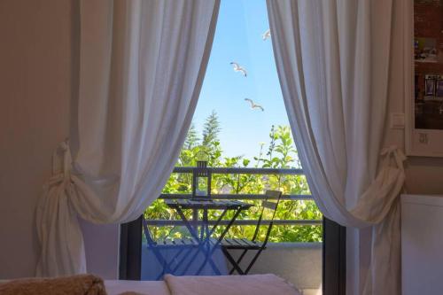 Μπαλκόνι ή βεράντα στο Villa Waves - Agios Nikolaos Anavyssos