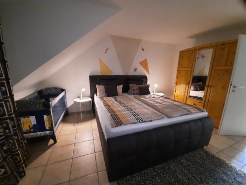 Postel nebo postele na pokoji v ubytování Gästehaus Moselblick