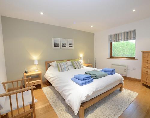 En eller flere senge i et værelse på Sandy Hills 8