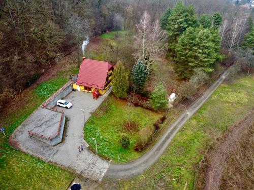 an aerial view of a house with a red roof at Tavas Vendégház in Karancsalja