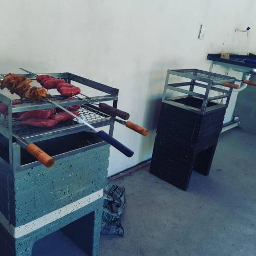 Ένα ή περισσότερα κρεβάτια σε δωμάτιο στο Pousada Recanto Setiba