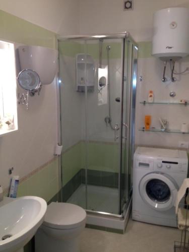 Koupelna v ubytování Pizzo Beach Club. One bedroom apt 13G