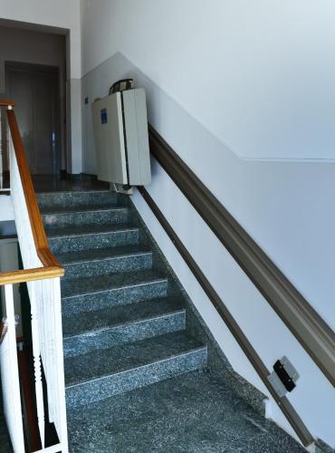 a stairs with a refrigerator in a building at B&B Nonna Teresa in Gragnano