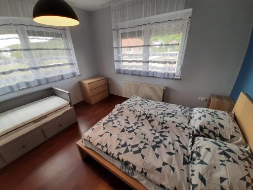 Ein Bett oder Betten in einem Zimmer der Unterkunft Zoli Vendégház