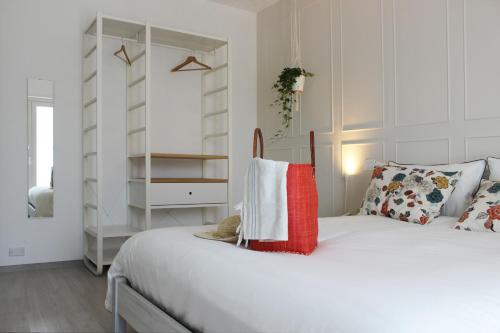 Ένα ή περισσότερα κρεβάτια σε δωμάτιο στο ReGenzio