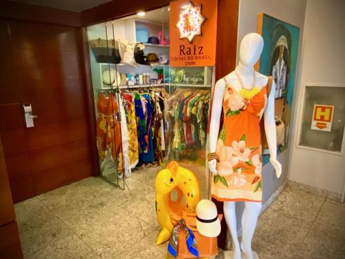 a mannequin standing in front of a clothing store at Kastel Manibu Recife - Boa Viagem in Recife