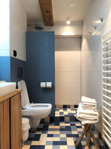 a bathroom with a toilet and a sink at 23 SouS in Amsterdam