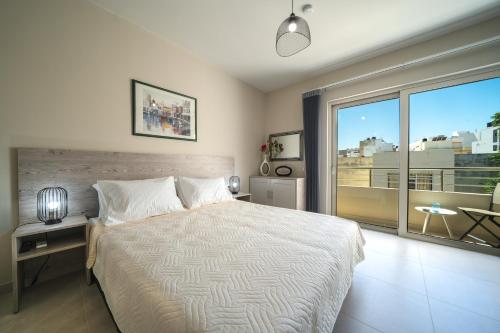 Cama ou camas em um quarto em LargaStrada Suites