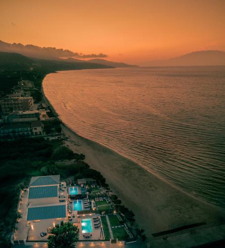 an aerial view of a beach at sunset at Alas Suites in Alykes