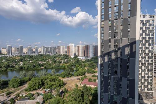 Nespecifikovaný výhled na destinaci Kyjev nebo výhled na město při pohledu z apartmánu