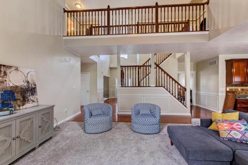 a living room with a couch and two chairs at Incredibly Spacious Carmel Home with Fully Equipped Kitchen - 4700 Sq Ft! Sleeps 15! Pet Friendly! home in Carmel