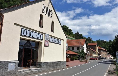 a building on the side of a street at Bunkr Karlštejn in Karlštejn