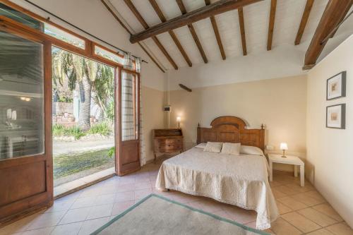 Postel nebo postele na pokoji v ubytování Agriturismo SS Annunziata