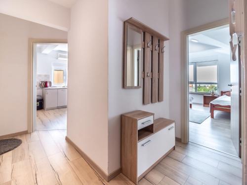 Posteľ alebo postele v izbe v ubytovaní Berat Apartment