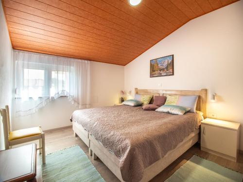 Posteľ alebo postele v izbe v ubytovaní Berat Apartment