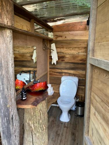 A bathroom at Purling Brook Falls Gwongorella