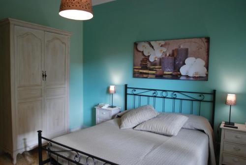 Un pat sau paturi într-o cameră la La Cannella