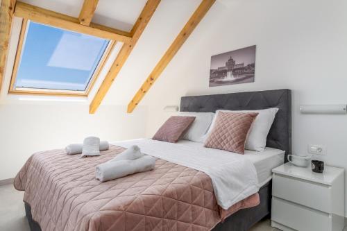 מיטה או מיטות בחדר ב-Villa Panorama