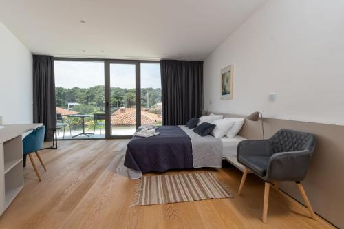 Ένα ή περισσότερα κρεβάτια σε δωμάτιο στο RM Luxury villa with pool in Rovinj