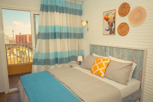 Кровать или кровати в номере Porto Golf Marina by Seven Seasons