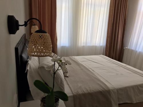 Una cama o camas en una habitación de Villa Günay