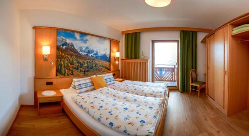 Postel nebo postele na pokoji v ubytování Biohof-Inntalblick