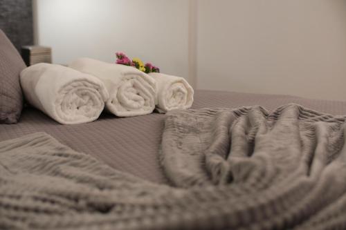 En eller flere senge i et værelse på Quinta da Mourinha