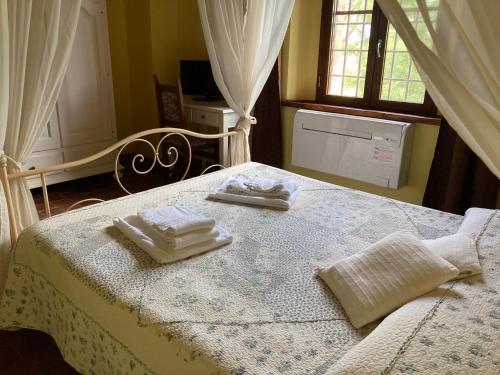 Кровать или кровати в номере Agriturismo Volta Di Sacco