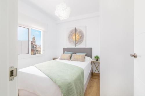 Posteľ alebo postele v izbe v ubytovaní Suite Homes Penthouse La Merced